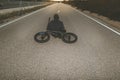 Guy standing bmx bike. BMX rider with and a sunset. Extreme urban sports Royalty Free Stock Photo