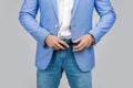 Guy in suit jacket and jeans. Casual style of guy, cropped view. Male accessory for guy in formalwear. Menswear concept Royalty Free Stock Photo