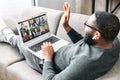 A guy talking online with friends via video call