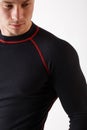 The guy in thermal underwear on a white background. Sportswear. Royalty Free Stock Photo