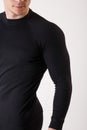 The guy in thermal underwear on a white background. Sportswear. Royalty Free Stock Photo