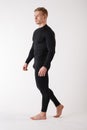 The guy in thermal underwear on a white background. Sportswear. Royalty Free Stock Photo