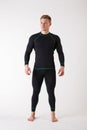 The guy in thermal underwear on a white background. Sportswear. Royalty Free Stock Photo