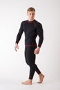 The guy in thermal underwear on a white background. Sportswear. Royalty Free Stock Photo