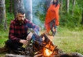 Guy with tired face and lonely at picnic, barbecue Royalty Free Stock Photo