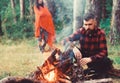 Guy with tired face and lonely at picnic, barbecue Royalty Free Stock Photo