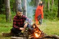 Guy with tired face and lonely at picnic, barbecue Royalty Free Stock Photo