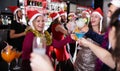 Guy with two girls on new year party in bar