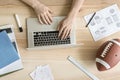 Guy using laptop in office