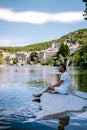 Guy on vacation in Ardeche France, view of the village of Vogue in Ardeche. France Royalty Free Stock Photo