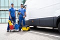 Guy With Vacuum Cleaner Royalty Free Stock Photo