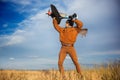 Guy in vintage clothes pilot with an airplane model outdoors Royalty Free Stock Photo