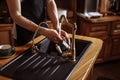 Guy is washing the dishes in the kitchen with modern interior Royalty Free Stock Photo