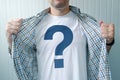 Guy wearing white t-shirt with question mark