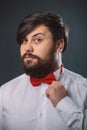 Guy in a white shirt with red tie bow Royalty Free Stock Photo
