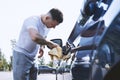 guy wipes his car Royalty Free Stock Photo