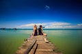Guy Woman Sit on Pier Photo Azure Sea in Tropics