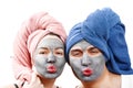 A guy with a girl looks at the camera and send an air kiss, mask for skin man and woman, guy with a girl make a mask for the skin Royalty Free Stock Photo