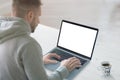 Guy work on laptop with isolated screen for mockup Royalty Free Stock Photo