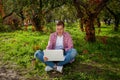 Guy working on laptop in the park Royalty Free Stock Photo