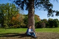 Guy working on laptop in the park Royalty Free Stock Photo