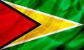 Guyana country flag on silk or silky waving texture Royalty Free Stock Photo