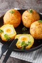 Guyanese Cassava Egg Balls closeup on the plate. Vertical Royalty Free Stock Photo