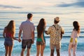 Guys and girls admire the view of the sea. Royalty Free Stock Photo