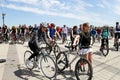 Guys and girls ride bikes during the cycling festival in Dnipro city.
