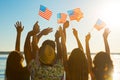 Guys and girls waving American flags. Royalty Free Stock Photo