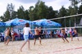 Guys play volleyball on the beach.Moscow. 07.08.2009