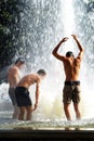 Guys showering in a fountain Royalty Free Stock Photo