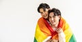 Guys spend time together at home, Portrait of Happy Asian gay couple embracing and showing their love under lgbt colorful rainbow Royalty Free Stock Photo