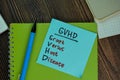 GVHD - Graft Versus Host Disease write on sticky notes isolated on Wooden Table