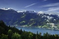 GView of Lake Thun and Bernese Alps including Jungfrau, Eiger and Monch peaks from the top of Niederhorn in summer, Switzerland Royalty Free Stock Photo