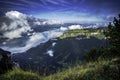 GView of Lake Thun and Bernese Alps including Jungfrau, Eiger and Monch peaks from the top of Niederhorn in summer, Switzerland Royalty Free Stock Photo