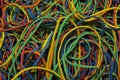 Background pattern of brightly coloured rubber bands