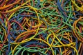 Background pattern of brightly coloured rubber bands