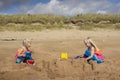 A young girls playing on the beach on a summers day Royalty Free Stock Photo