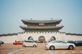 Gyeongbokgung Front gate view Seoul, South Korea with cars passing by