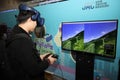 Gyeonggi-do,South Korea-March 2019: Korean man playing a 3D virtual reality game with glasses