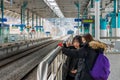 Two cute young Korean girls are taking selfie at Gapyeong Station Royalty Free Stock Photo