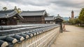 Gyeonggijeon shrine buildings and Jeondong Francis Xavier cathedral an old catholic church in background Jeonju South Korea