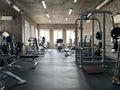 Gym for bodybuilding. Heavy dumbbells and exercise equipment. Barbells and equipment for athletes