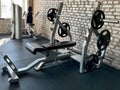 Gym for bodybuilding. Heavy dumbbells and exercise equipment. Barbells and equipment for athletes