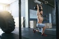 Gym. Crossfit Man Training With Dumbbells At Fitness Club