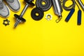Gym equipment on yellow background. Space for text Royalty Free Stock Photo