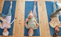 Gym, fitness, and elderly women group in yoga class from above, stretch and wellness exercise for cardio health together Royalty Free Stock Photo