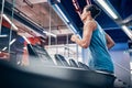 Gym, fitness and man running on treadmill for health, wellness and cardio exercise, alone and power. Runner, workout and Royalty Free Stock Photo