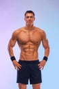 Man athlete isolated on color background. Gym full body workout. Muscular man athlete in fitness gym have havy workout